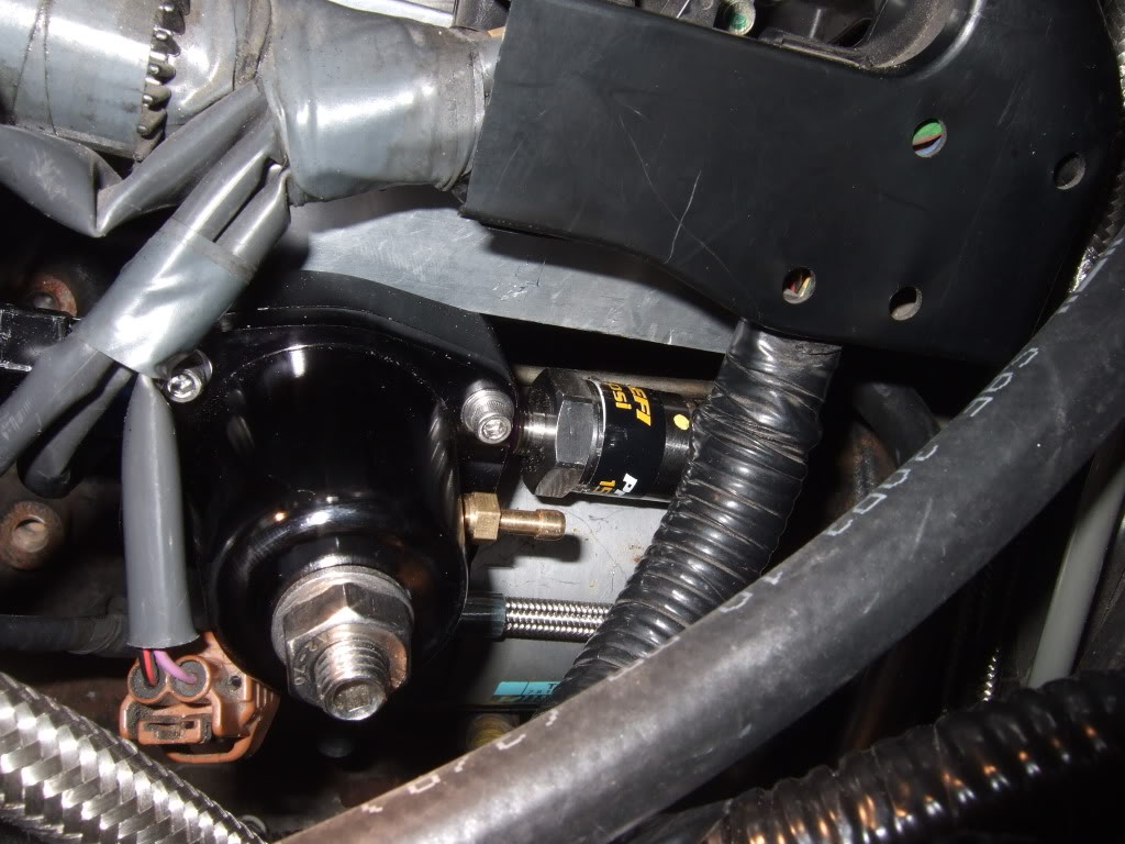 Fuel pressure regulator installed in engine bay