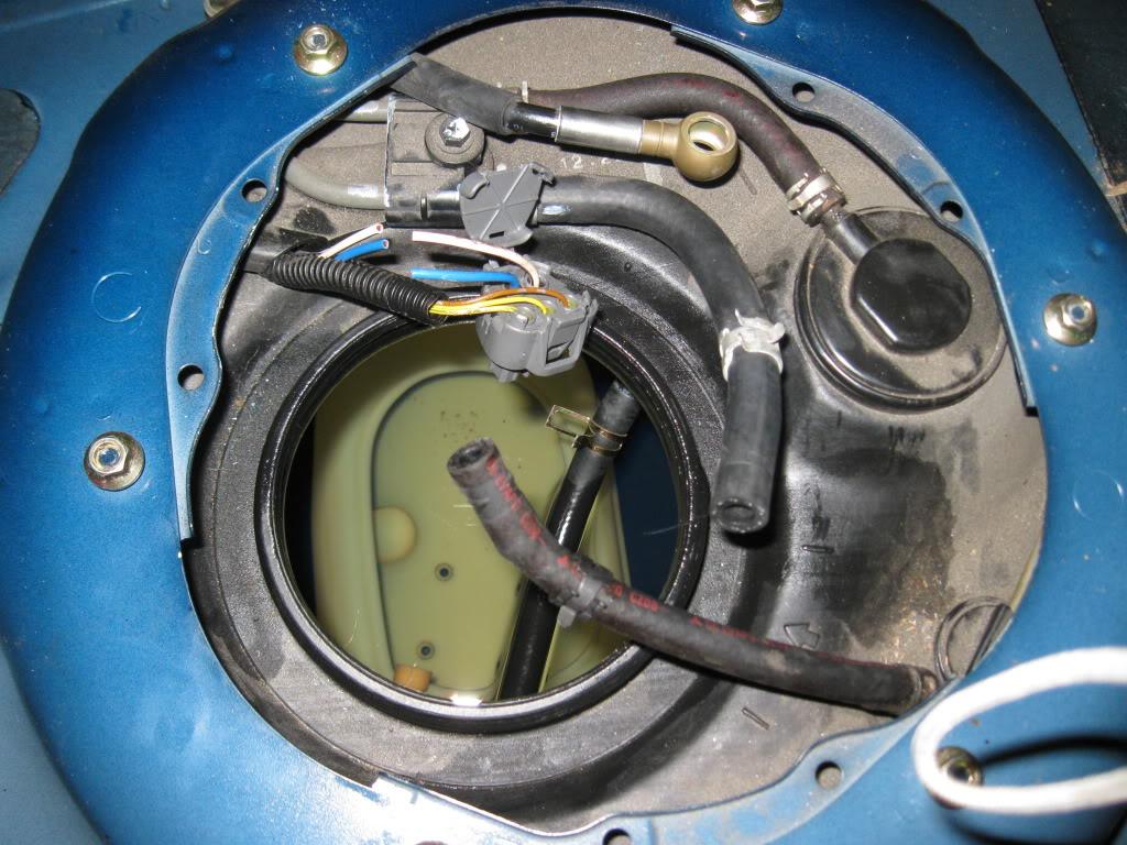 gas tank top with fuel sending unit removed