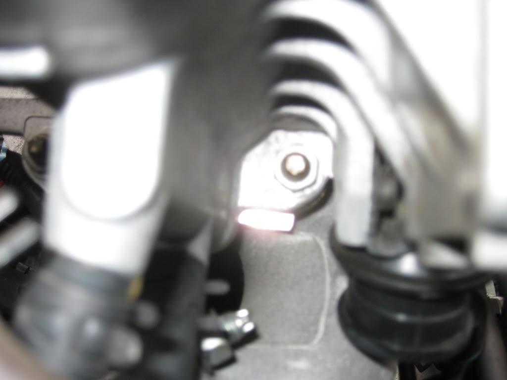 under nut holding on throttle body