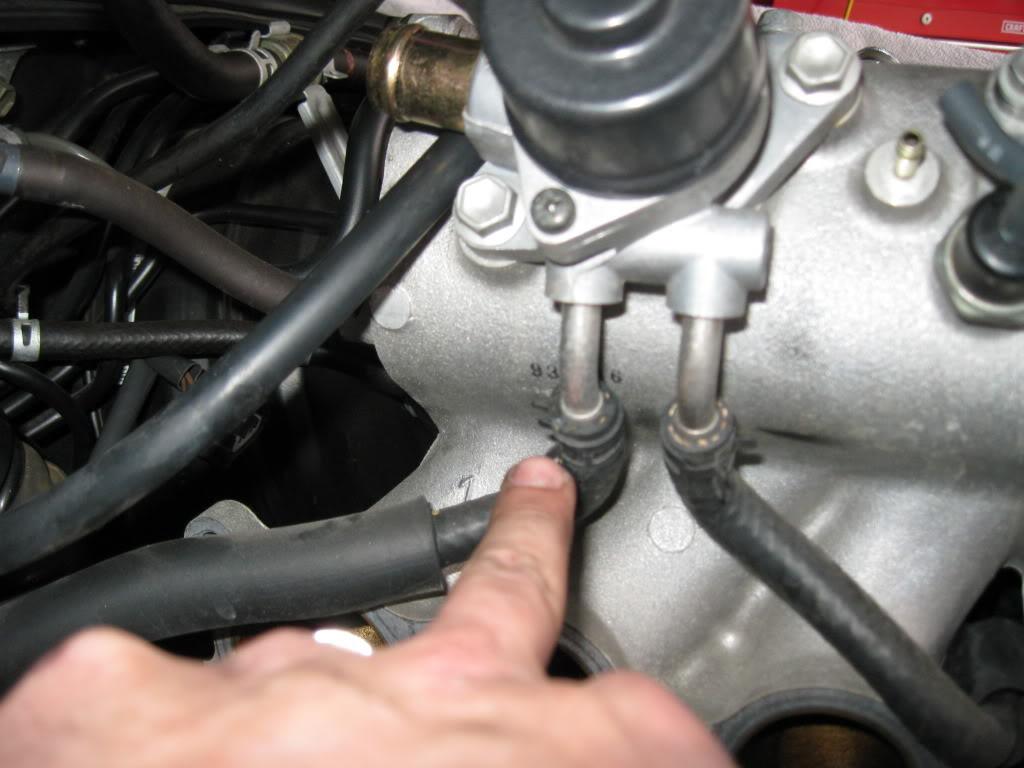 coolant hoses still connected to the IACV