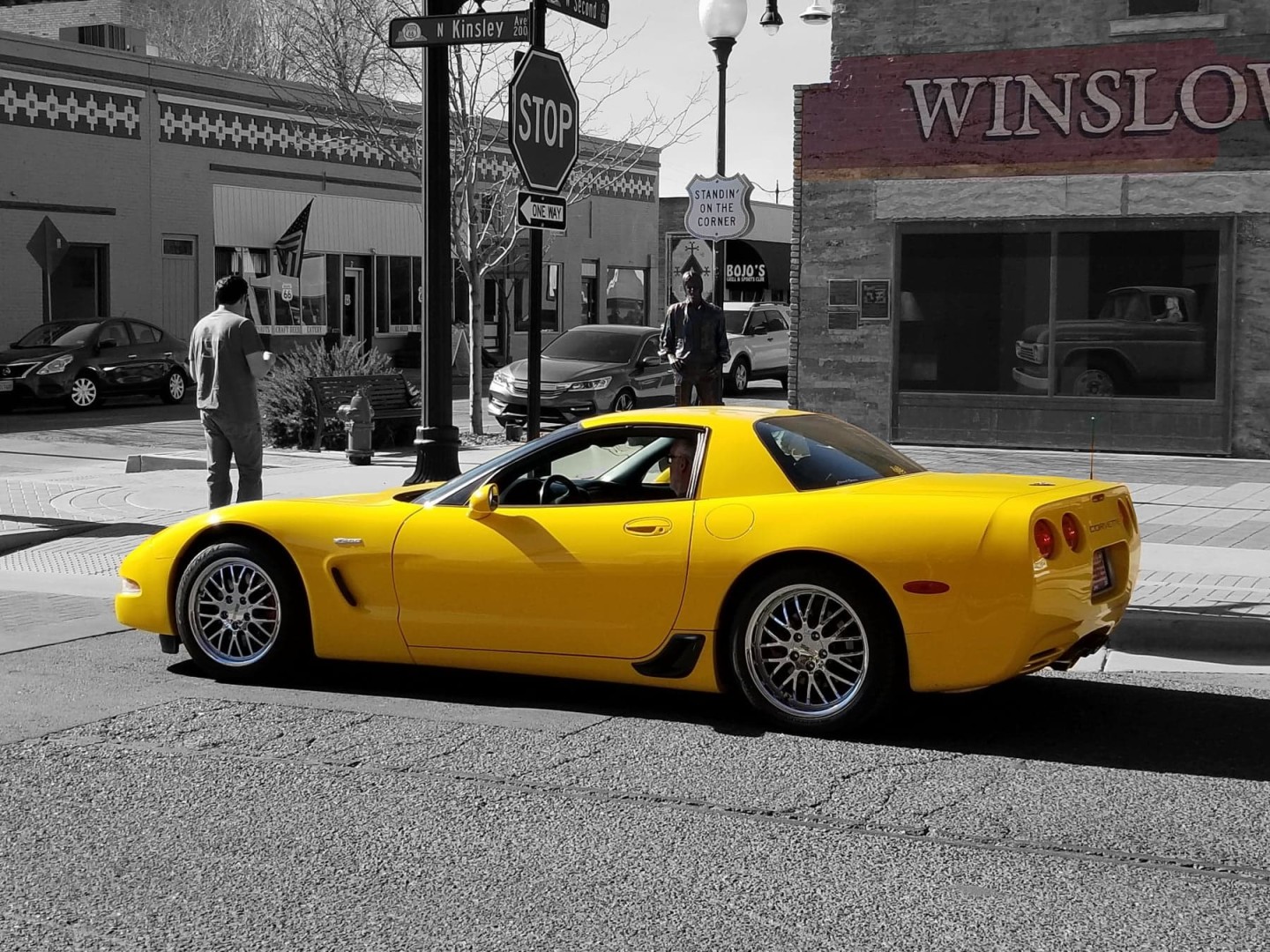 Standing on a corner in Winslow, Arizona.