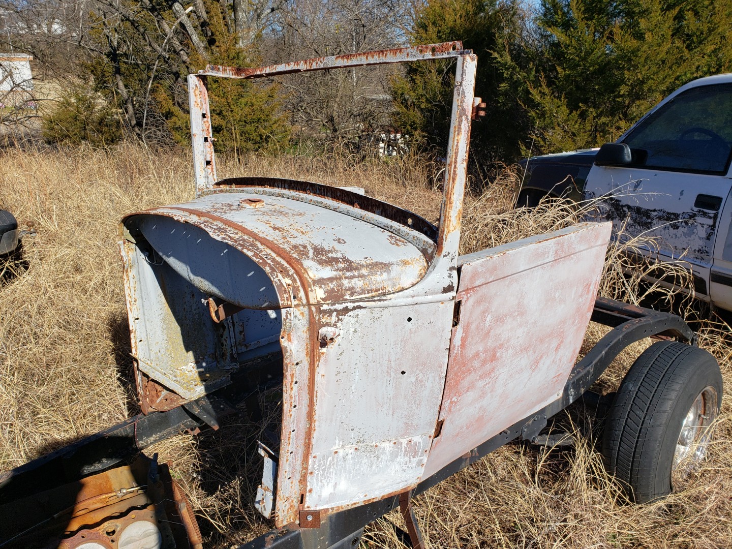 Cowl and doors from a 30/31 Ford coupe that has had it's top cut off.