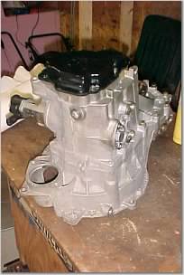 clean VW transmission sitting on table with clutch face downward