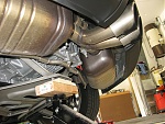 http://www.planet-9.com/attachments/981-cayman-boxster-modifications/51797d1412820290t-tutorial-how-remove-exhaust-diy-exhaust-removal-img_0016.jpg (http://www.planet-9.com/attachments/981-cayman-boxster-modifications/51797d1412825455-tutorial-how-remove-exhaust-diy-exhaust-removal-img_0016.jpg)(http://www.planet-9.com/attachments/981-cayman-boxster-modifications/51799d1412825548-tutorial-how-remove-exhaust-diy-exhaust-removal-img_0019.jpg)Step 4: Once the car is stable and propped on the rear jack stands safely, then proceed with removing the rear tires. You will need a 19mm socket wrench. Remove all the bolts and save the top most bolts to remove at the end (the wheels tend to slip off once all the bolts are removed--this is the pro-tip to do this simple process well.) Carefully remove the top bolt and have someone hold the wheel. Be careful when you remove the wheels as you risk damage to the brakes / rotors during this step (particularly if the wheel drops). In the last pic here you can see the post-cat pipe of the exhaust.