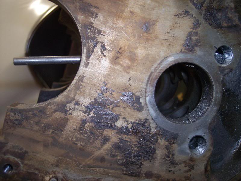 This hole actually is intersected by a hole drilled from the number 1 main saddle, to deliver the oil to the passenger side main galley