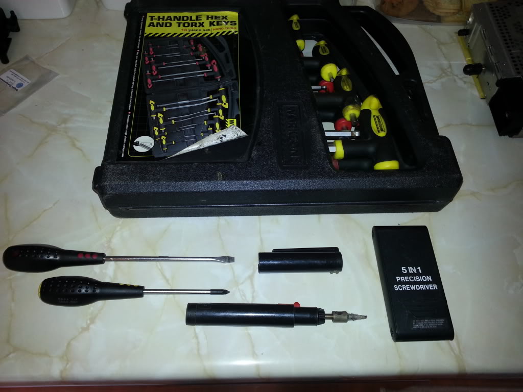 T-handle hex and torx keys, screwdrivers, light, and precision screwdriver