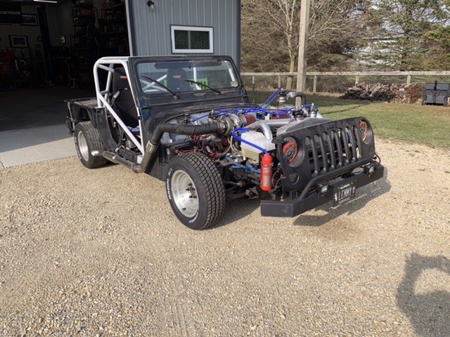 C4 chassis with a twin turbo LS and a Jeep YJ cowl and windshield