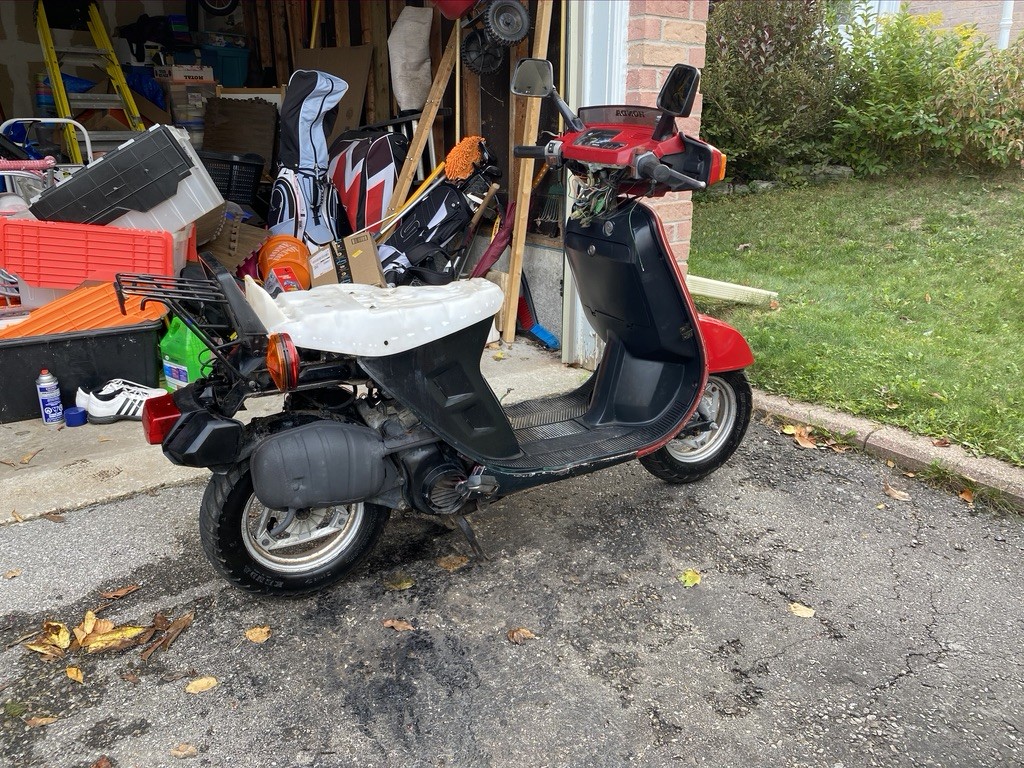 Cleaned the wheels, degreased what I could, cleaned the tires, repainted the exhaust and conditioned all the black plastic as best I could. Rear plastics have been found I just have to go get them