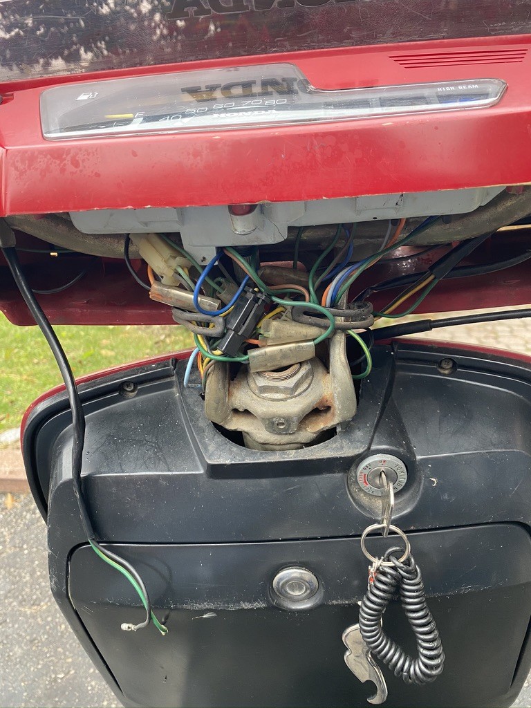 Finally tested, re-ran, re-connected and secured all the main wiring harness to the head. The only wires left out are for the malfunctioning brake switch for the rear brakes but their location has been noted, labelled and run properly for easy installation