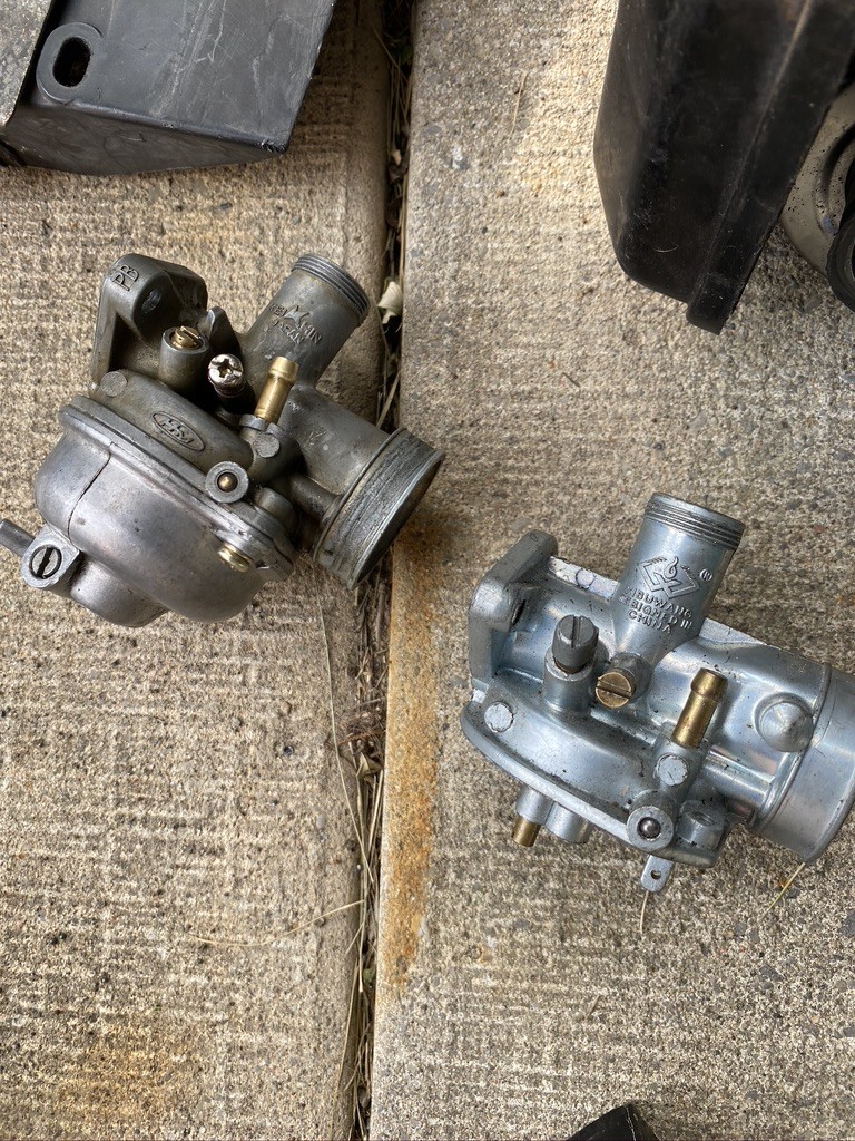 The scooter came with an extra carb but it was Chinese junk. I used the good fittings and brass out of it to revamp the stock carb. New needle, float, gaskets, lines, adjustment and a good clean were all it really needed