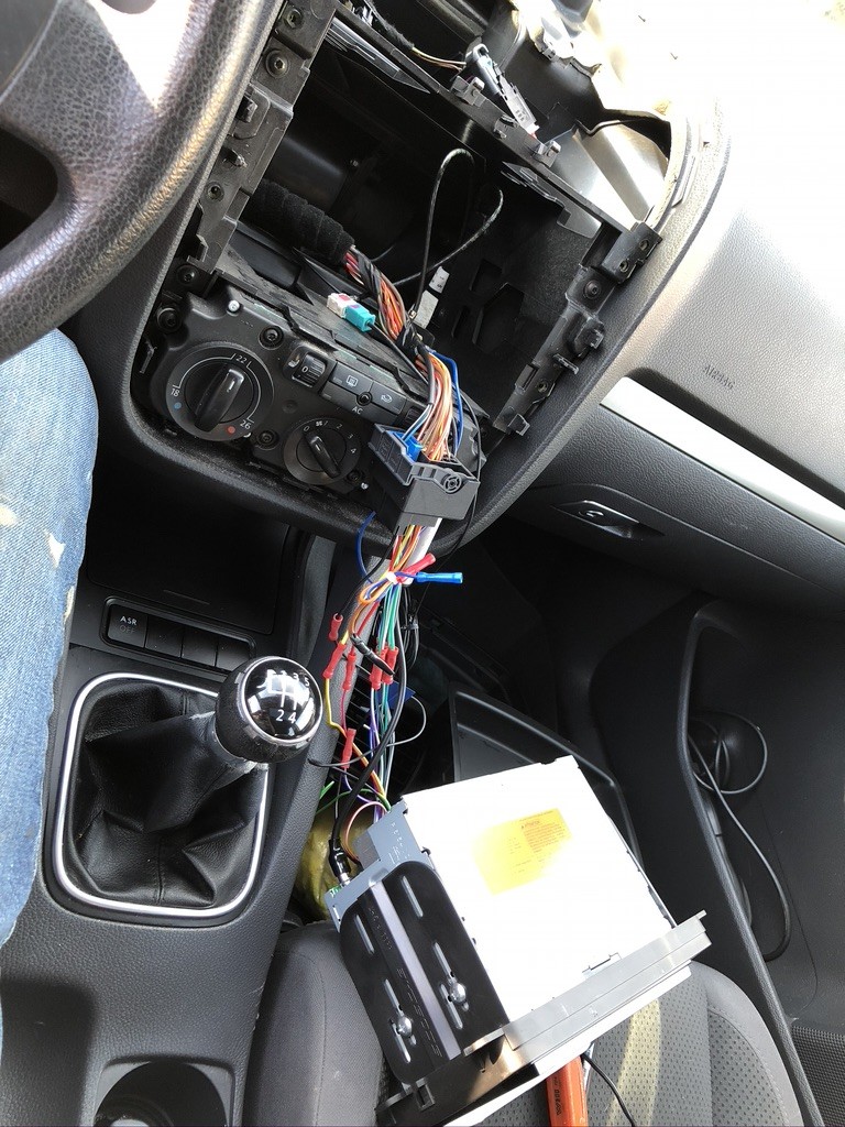 Rewiring the aftermarket stereo back to OEM harness so that I can throw an OEM ApplePlay unit in when I have the funds for it. While I was in here I also fixed some issues with my centre vents and added an iPod charging cord to the back of the unit that comes up through the upper cubby. I had a wireless charger glued to the upper cubby for some time but because I can't display my phone on the Pioneer screen it was useless so I removed it until a later time