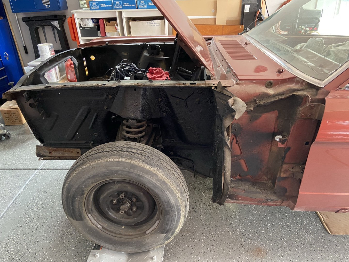 What made the car "look" really nice from a distance was the years of rubberized undercoating that was sprayed all over the underside and inside the fender wells and trunk. This just covered up the bad and makes getting to it all a real chore. 